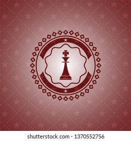 chess king icon inside badge with red background