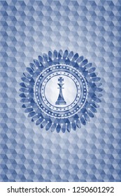 chess king icon inside blue emblem with geometric pattern background.