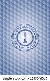 chess king icon inside blue badge with geometric pattern.