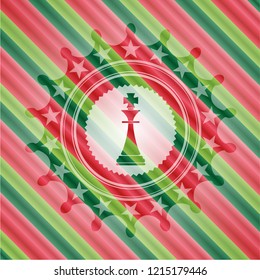 chess king icon inside christmas badge.