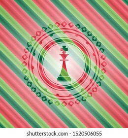 chess king icon inside christmas style badge..