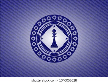 chess king icon inside emblem with jean high quality background