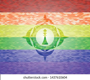 chess king icon inside emblem on mosaic background with the colors of the LGBT flag