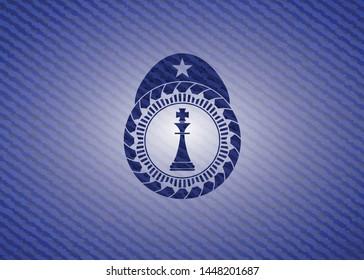 chess king icon inside emblem with jean high quality background