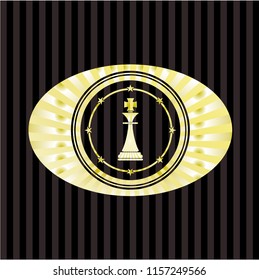chess king icon inside gold badge or emblem