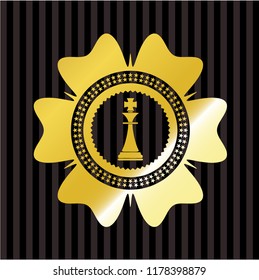 chess king icon inside gold shiny badge