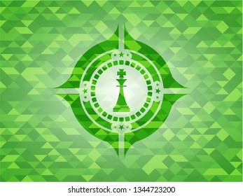 chess king icon inside green emblem. Mosaic background