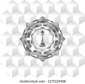 chess king icon inside grey badge with geometric cube white background