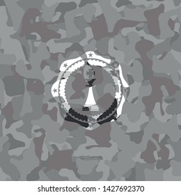 chess king icon inside grey camo texture