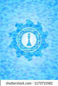 chess king icon inside light blue mosaic emblem