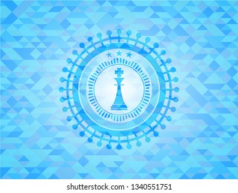chess king icon inside light blue mosaic emblem