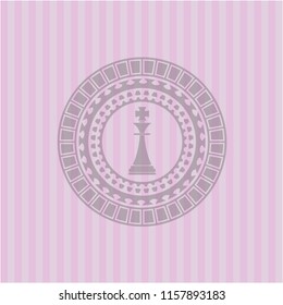 chess king icon inside pink emblem