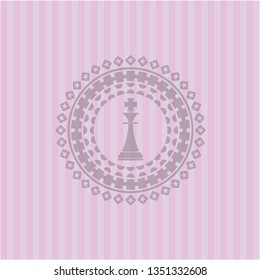 chess king icon inside pink emblem