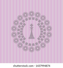 chess king icon inside pink emblem