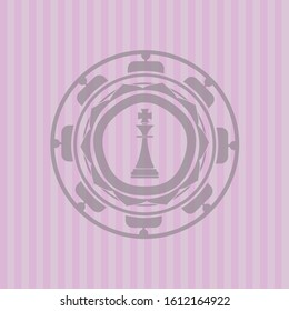 chess king icon inside pink emblem