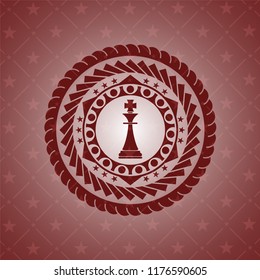 chess king icon inside realistic red emblem