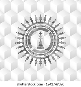 chess king icon inside realistic grey emblem with geometric cube white background