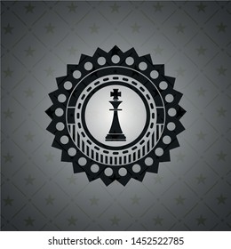 chess king icon inside realistic dark emblem
