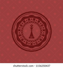 chess king icon inside red icon or emblem