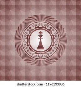 chess king icon inside red seamless badge with geometric pattern background.
