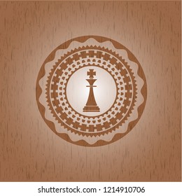 chess king icon inside retro wood emblem
