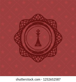 chess king icon inside retro style red emblem