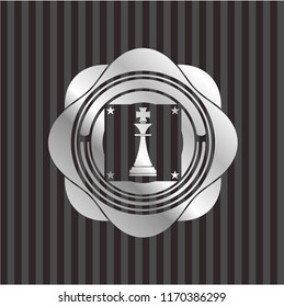 chess king icon inside silver emblem