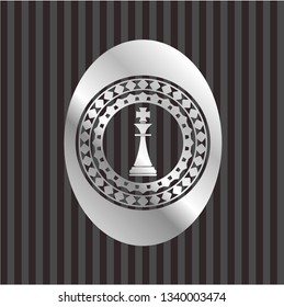 chess king icon inside silver shiny emblem
