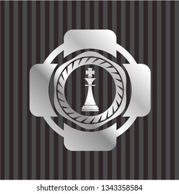 chess king icon inside silver badge