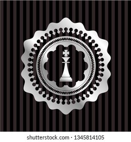 chess king icon inside silver emblem or badge