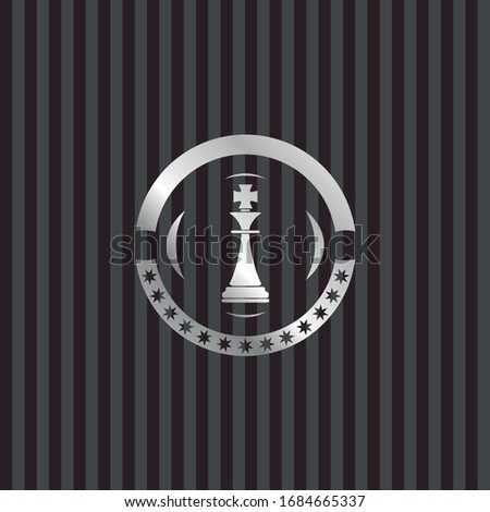 chess king icon inside silver badge or emblem