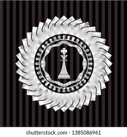 chess king icon inside silvery badge or emblem