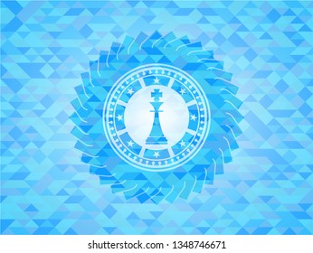 chess king icon inside sky blue emblem. Mosaic background