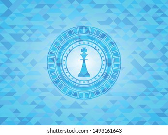 chess king icon inside sky blue emblem with mosaic ecological style background