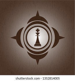 chess king icon inside wood emblem. Retro
