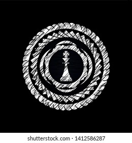 chess king icon on chalkboard