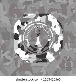 chess king icon on grey camo pattern