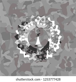 chess king icon on grey camo pattern