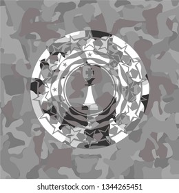 chess king icon on grey camouflaged texture