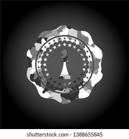 chess king icon on grey camouflage texture