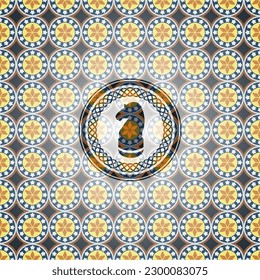 chess knight icon inside arabesque style badge. arabic decoration. 