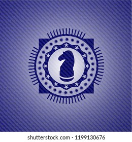 chess knight icon inside badge with denim background