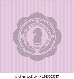 chess knight icon inside badge with pink background