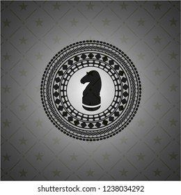 chess knight icon inside black badge