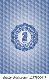 chess knight icon inside blue emblem or badge with abstract geometric polygonal pattern background.