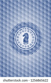 chess knight icon inside blue badge with geometric pattern.