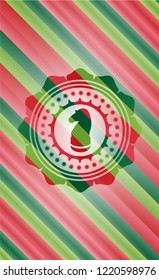 chess knight icon inside christmas badge.