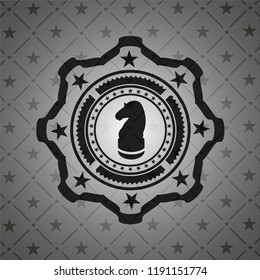 chess knight icon inside dark badge or emblem