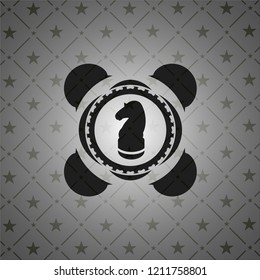 chess knight icon inside dark emblem