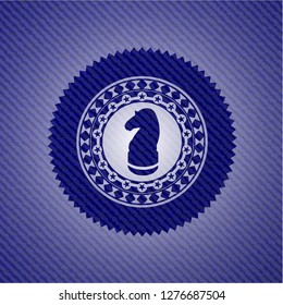 chess knight icon inside emblem with jean high quality background